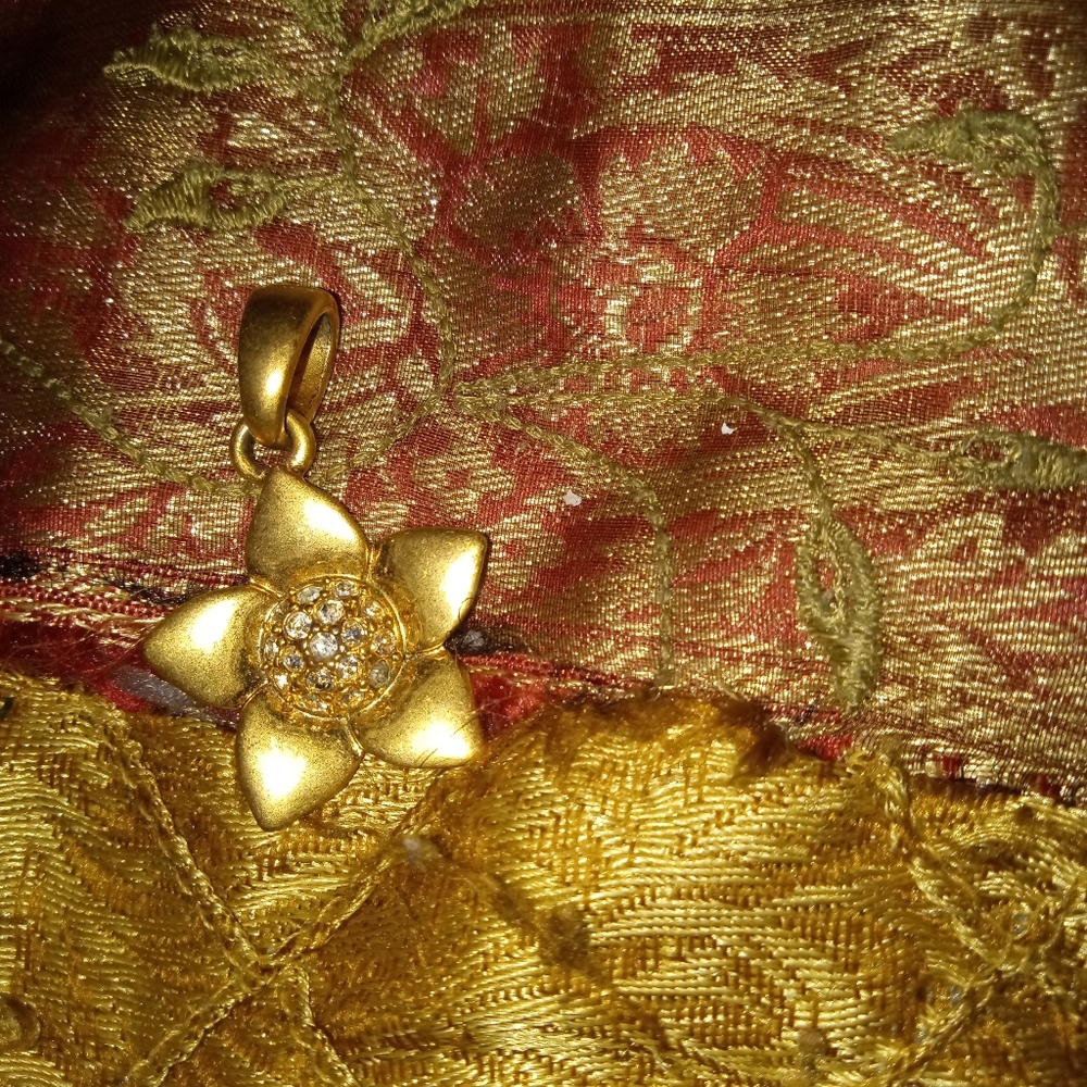My grandma's pendant the gold has never been tested
